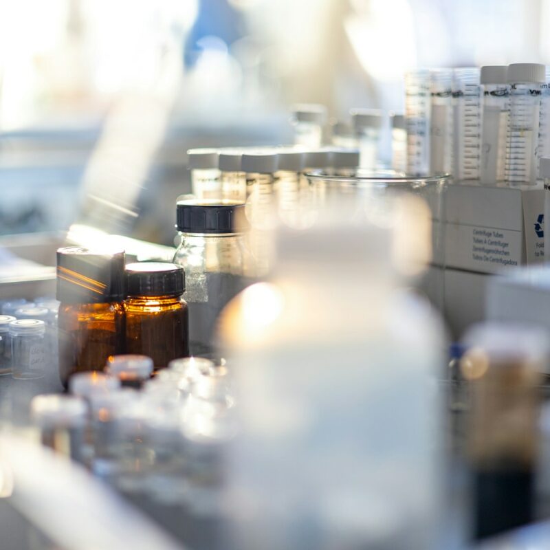 bottles of medicine are lined up on a table