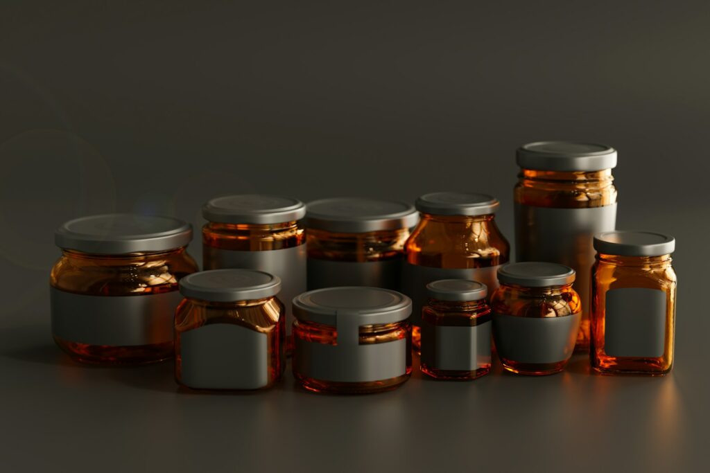 a group of jars with lids on a table